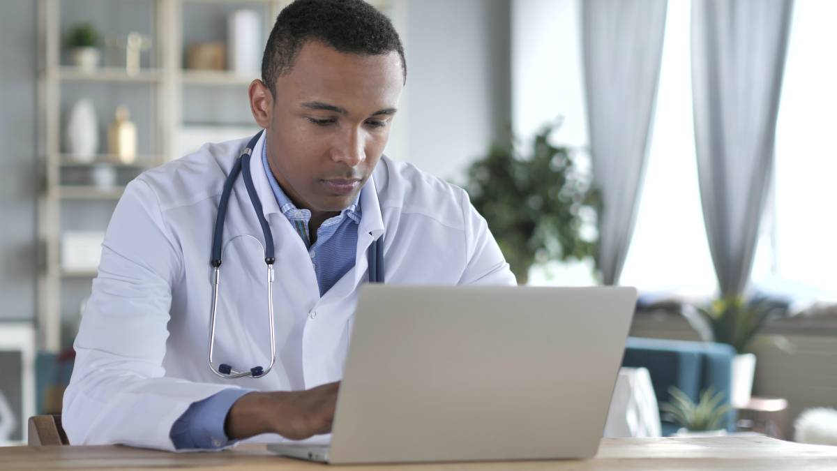 A physician references the ICD-10 database